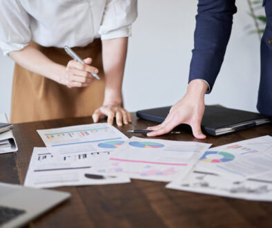 Asian business person having a meeting with paper materials